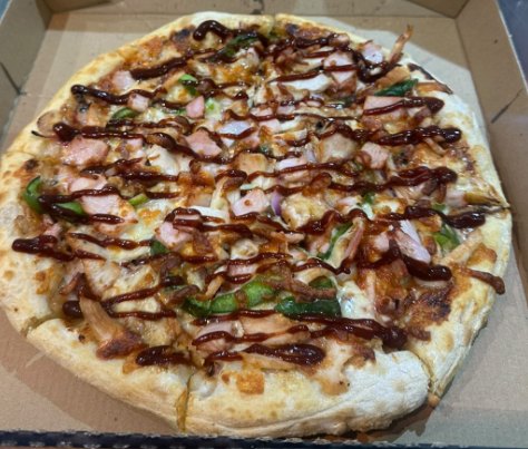 The BBQ Boss pizza in the box